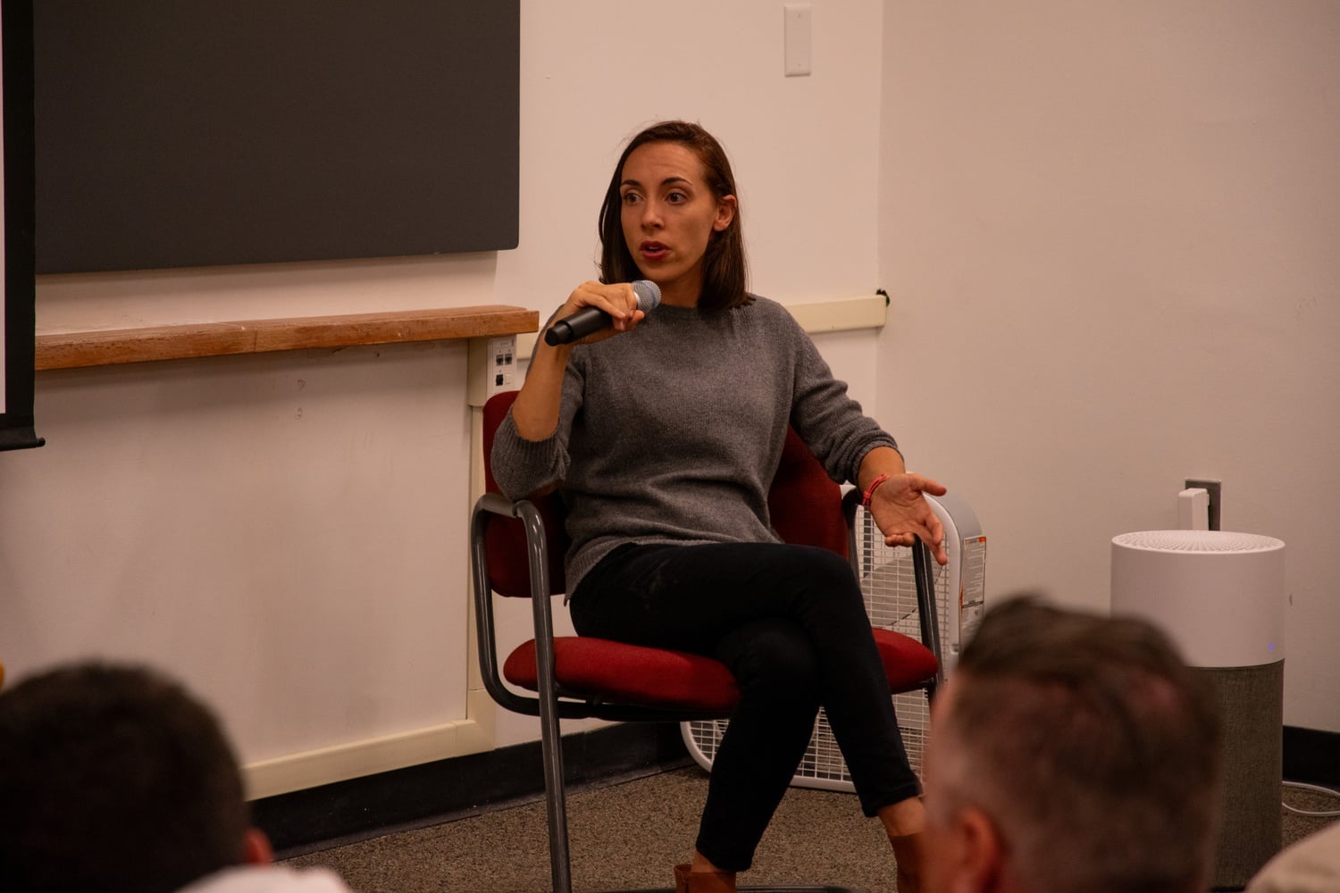 Adrienne Klein speaks at a Cambridge City Council candidate forum hosted by the Harvard graduate students union on Tuesday night.