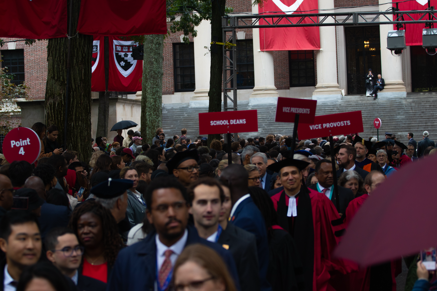 Harvard faculty and administrators proceeded to the stage at Tercentenary Theatre during University President Claudine Gay's inauguration.