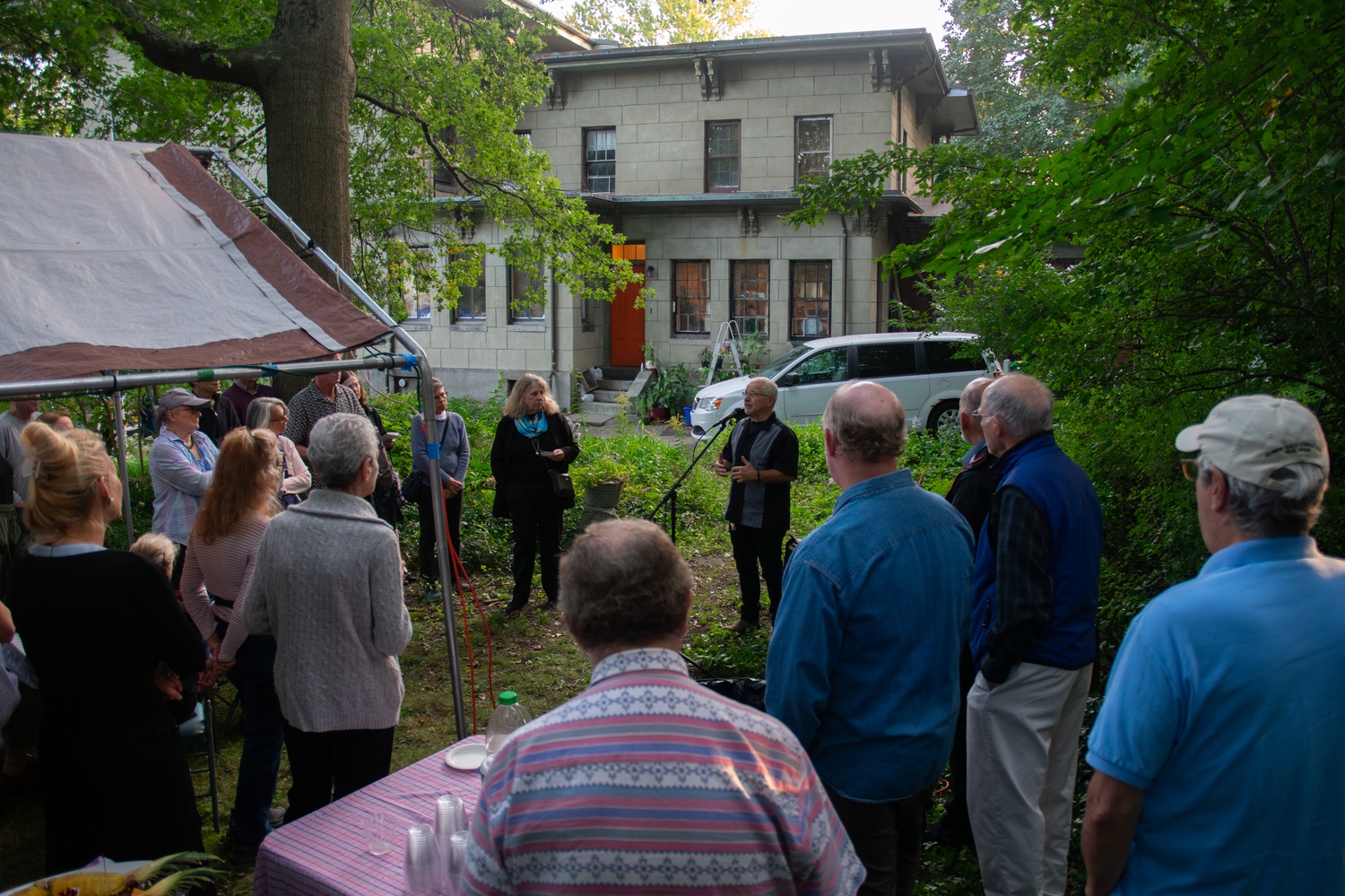Federico Muchnik, one of the CCC's endorsees for Cambridge City Council, speaks to a crowd of more than 40 people at the organization's celebration.