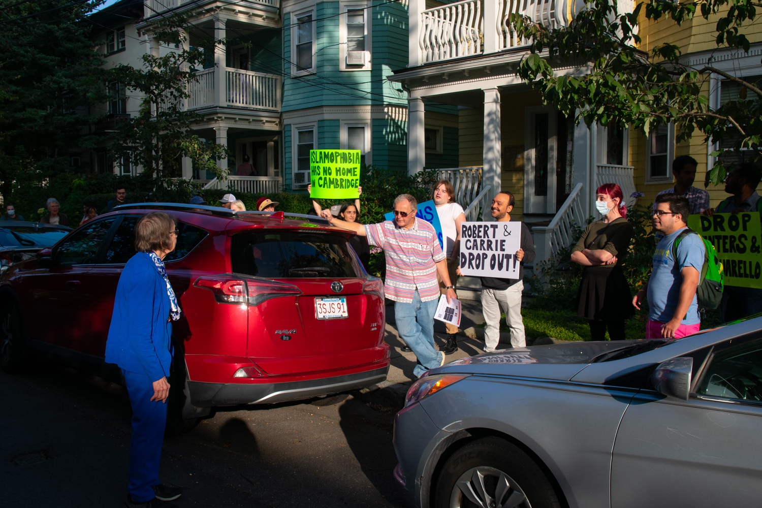 Sara Mae Berman, who hosted the event at her house, walked across the street to confront the protesters.