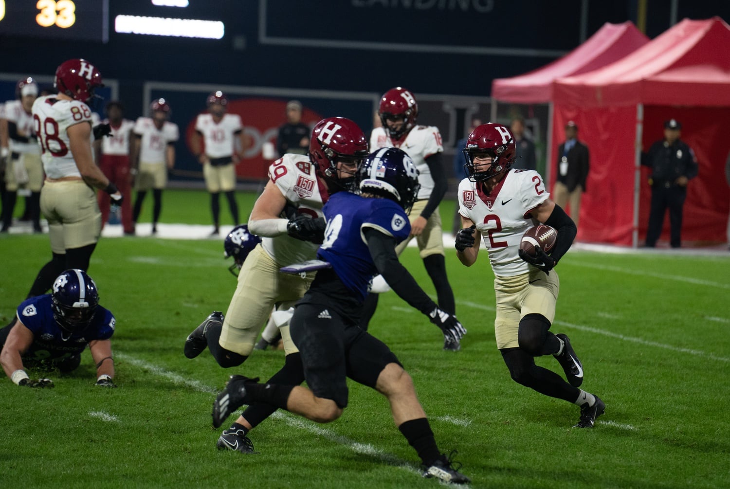 Sophomore wide receiver Cooper Barkate looks for a running lane against Holy Cross on September 30.