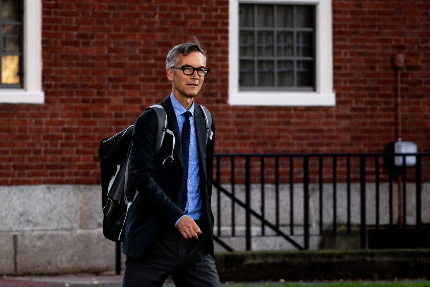 Dean of Arts and Humanities Robin E. Kelsey leaves the first in-person Faculty of Arts and Sciences faculty meeting of the school year.