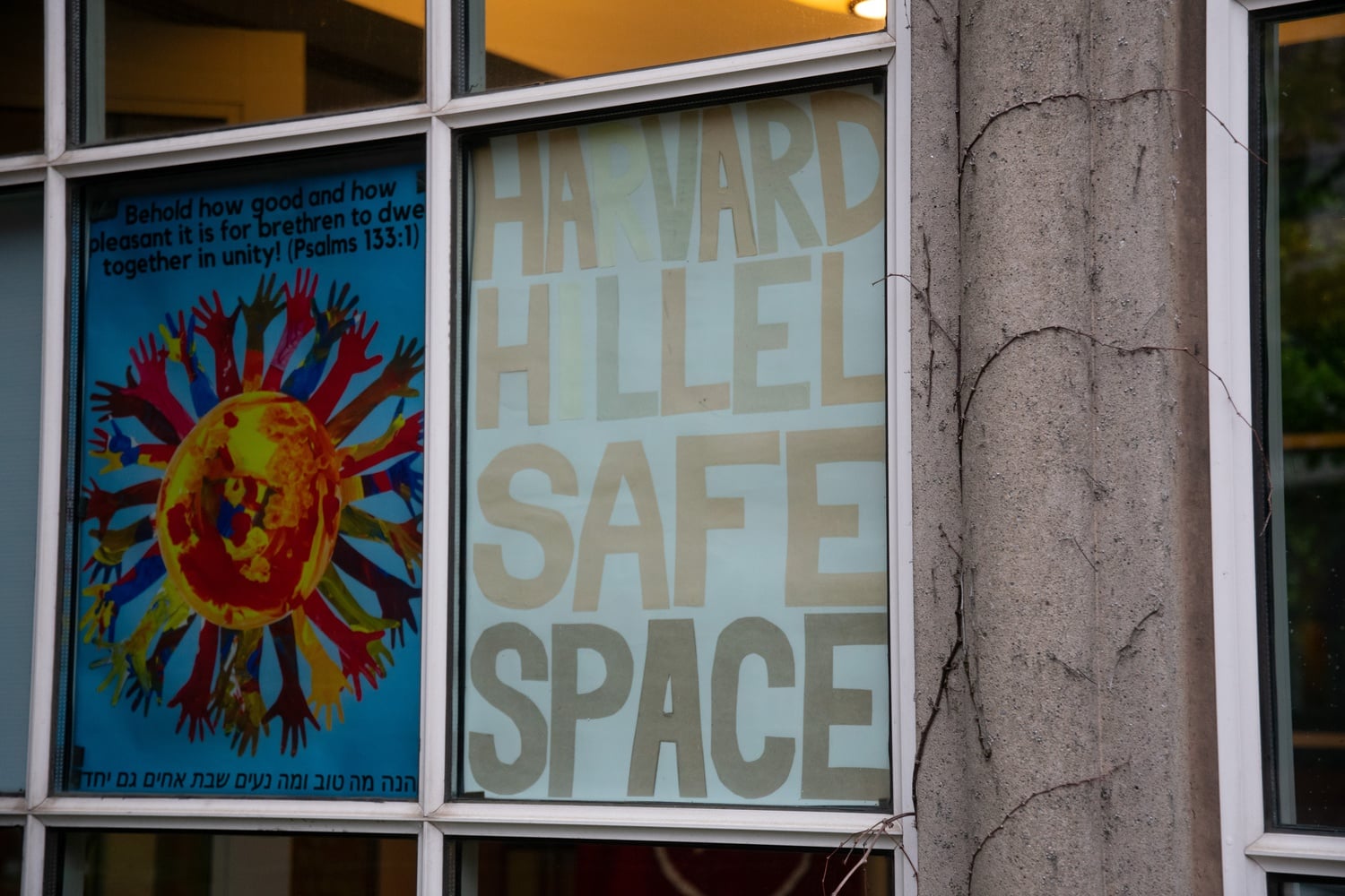 A sign in the windows of Harvard Hillel's building reads 'Harvard Hillel Safe Space'.