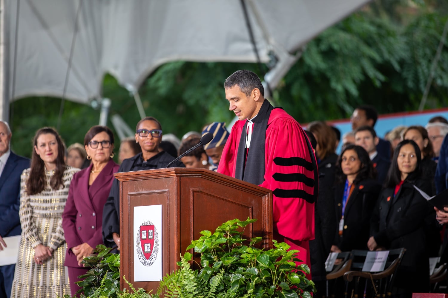 Pusey Minister Matthew Ichihashi Potts speaks at the inauguration of Harvard President Claudine Gay.