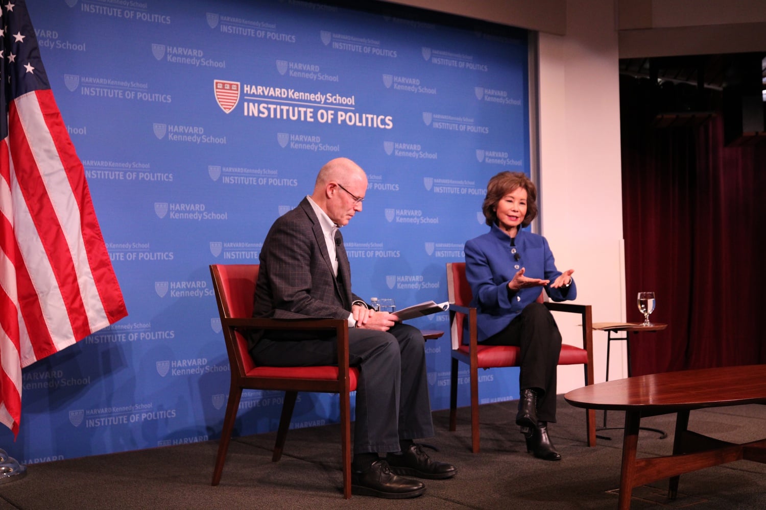 Former U.S. Secretary of Transportation Elaine L. Chao spoke with Harvard Business School senior lecturer John D. Macomber at Harvard Institute of Politics forum Tuesday.