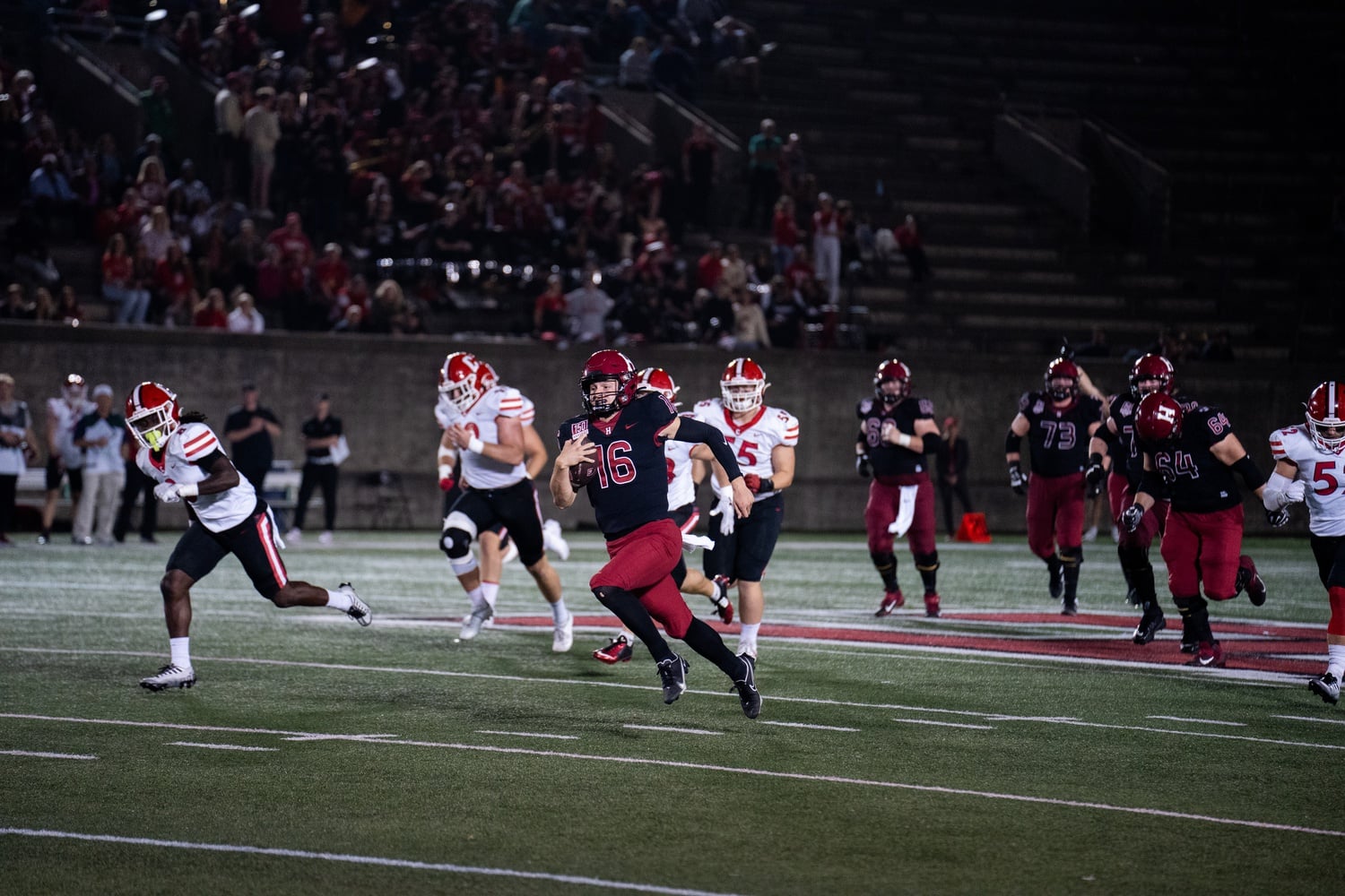 Junior quarterback Charles DePrima makes a run for the ball in Harvard's game against Cornell last Friday. In the FCS, he takes first in rush yards per carry (9.22) and points responsible per game (21.5).