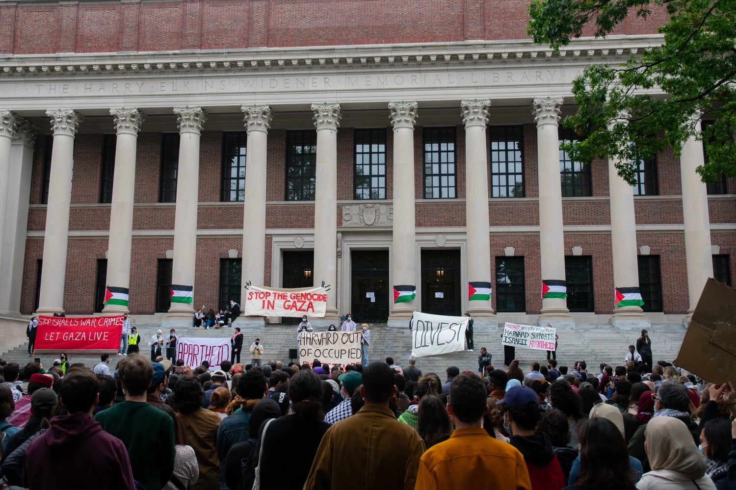 More than 1,000 gathered for an October protest on Widener Library's steps co-organized by the PSC. In the last month, however, the group has refrained from official public protests.