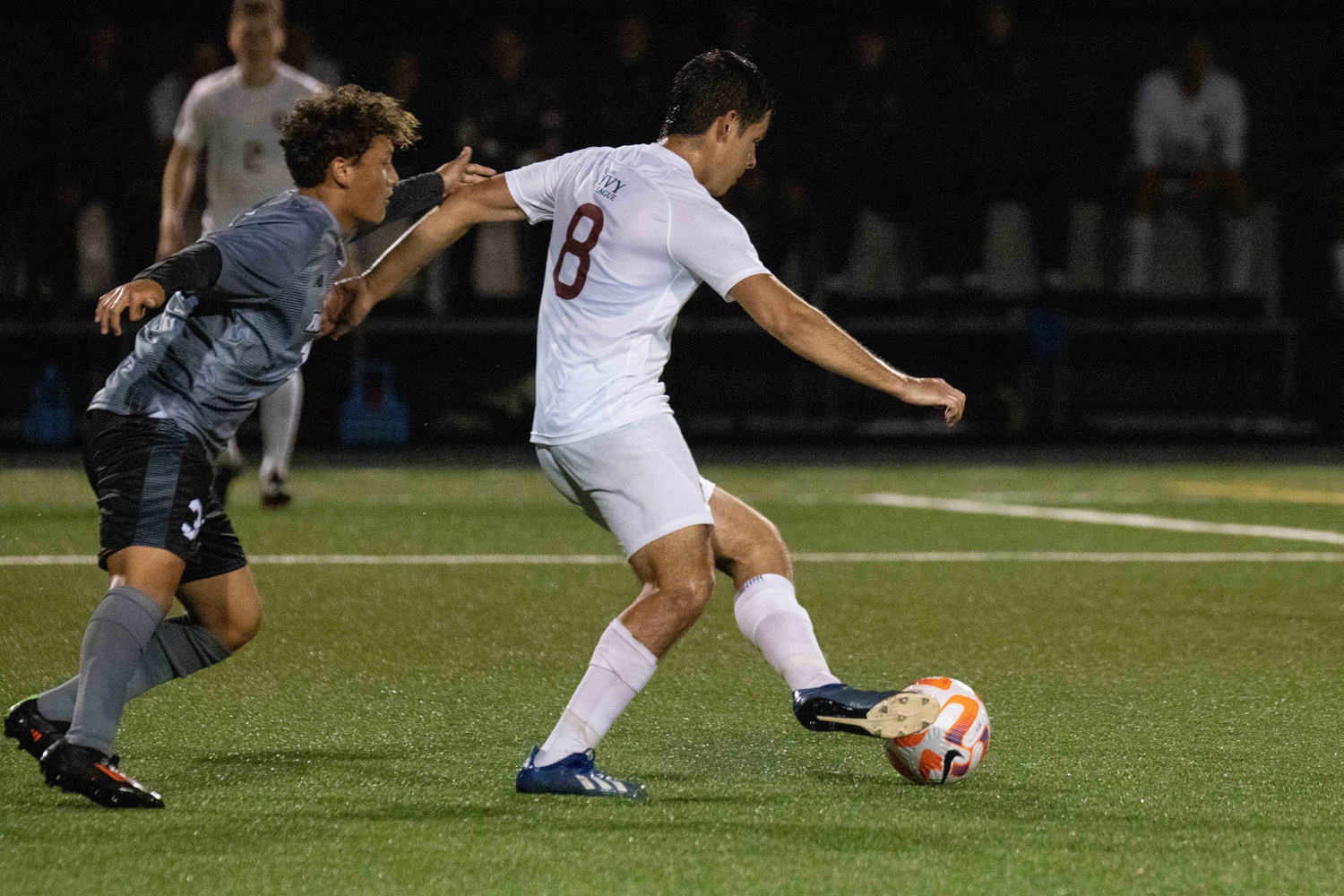 Then-sophomore midfielder Marko Isakovic looks for space to maneuver against Bryant on September 6, 2022.