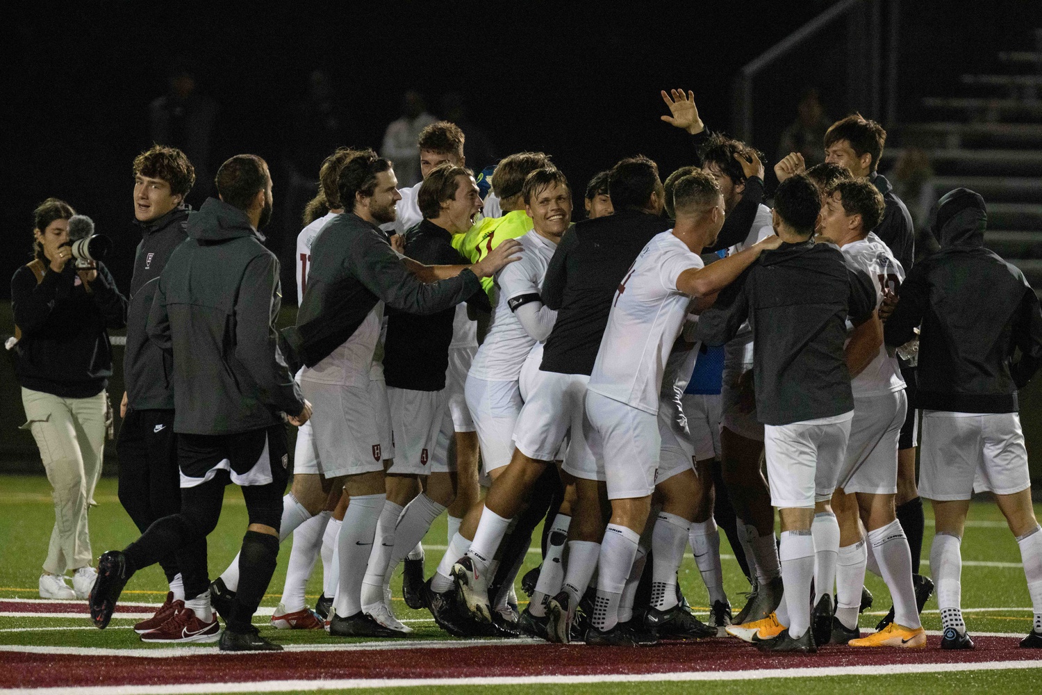 Harvard men's soccer celebrates its last-second victory over Bryant University on September 6, 2022.