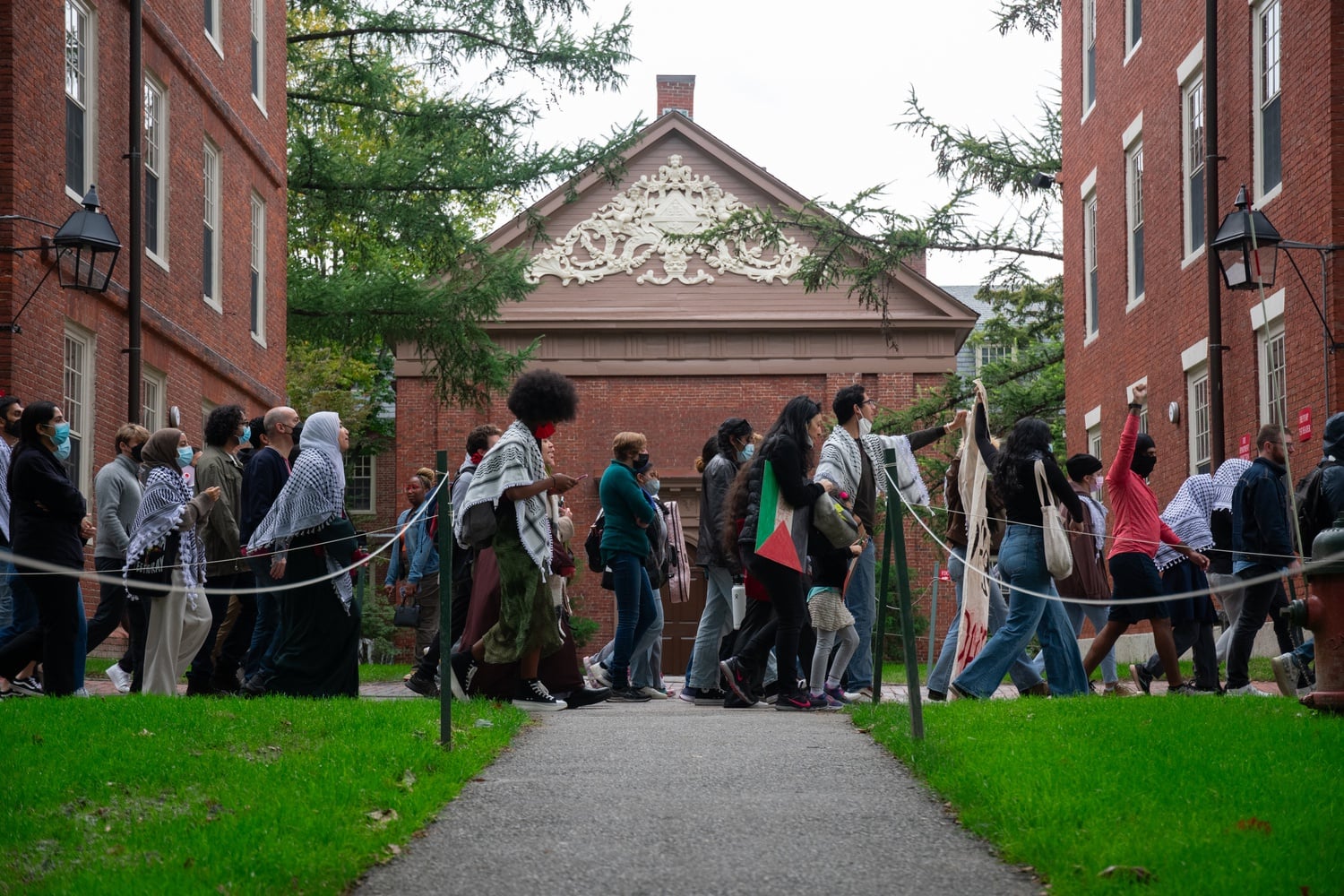 More than 1,000 demonstrators rallied in Harvard Yard on Oct. 14 in solidarity with Palestine. Harvard has drawn significant national scrutiny over student group as well as institutional responses to the Israel-Hamas war.