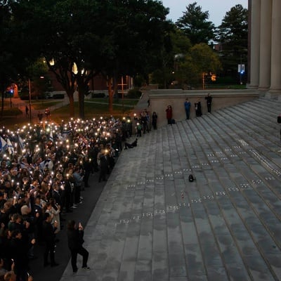 Cover image for At Harvard Yard Vigil, More Than 1,000 Mourn Victims of Hamas Attacks, Stand with Israel