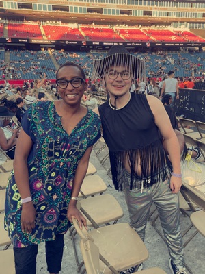 Cover image for Harvard President Claudine Gay with Student at Beyoncé Concert