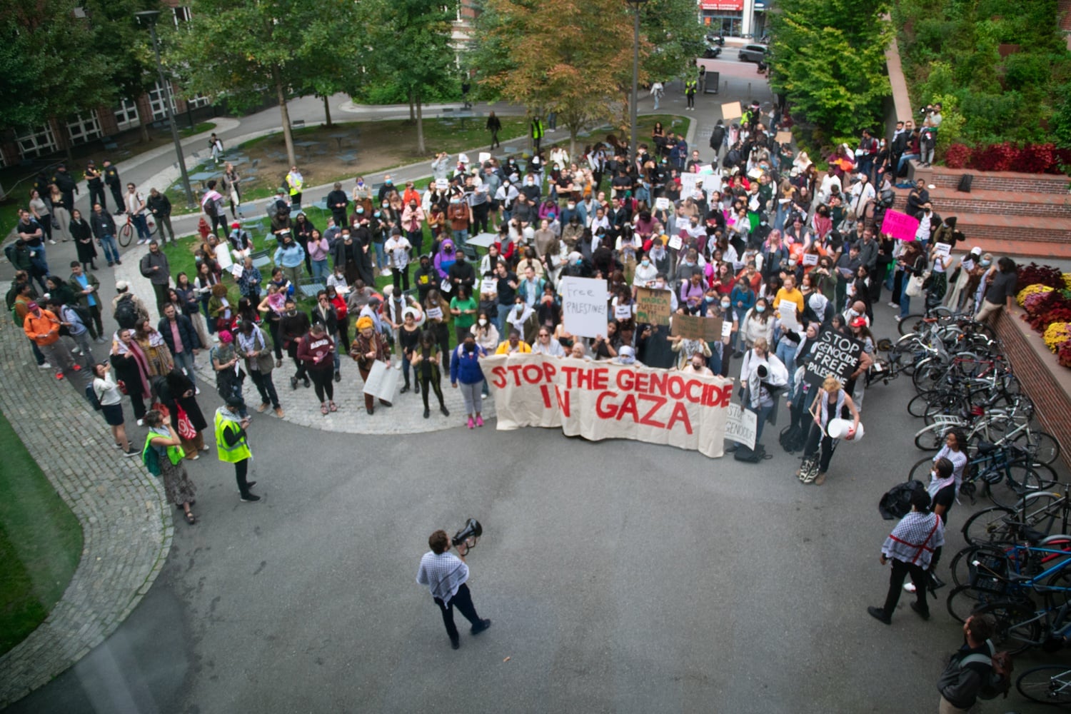 Protesters supporting Palestine gather in the Harvard Kennedy School Courtyard on Thursday afternoon.