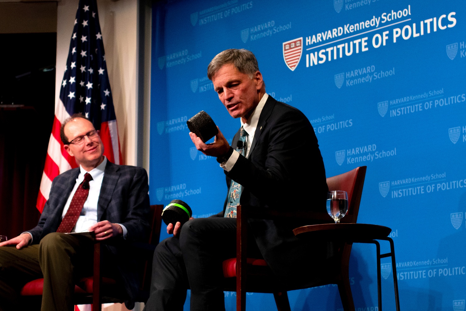 Wyoming Governor Mark Gordon, right, spoke about the state's economy at an Institute of Politics forum Monday evening.