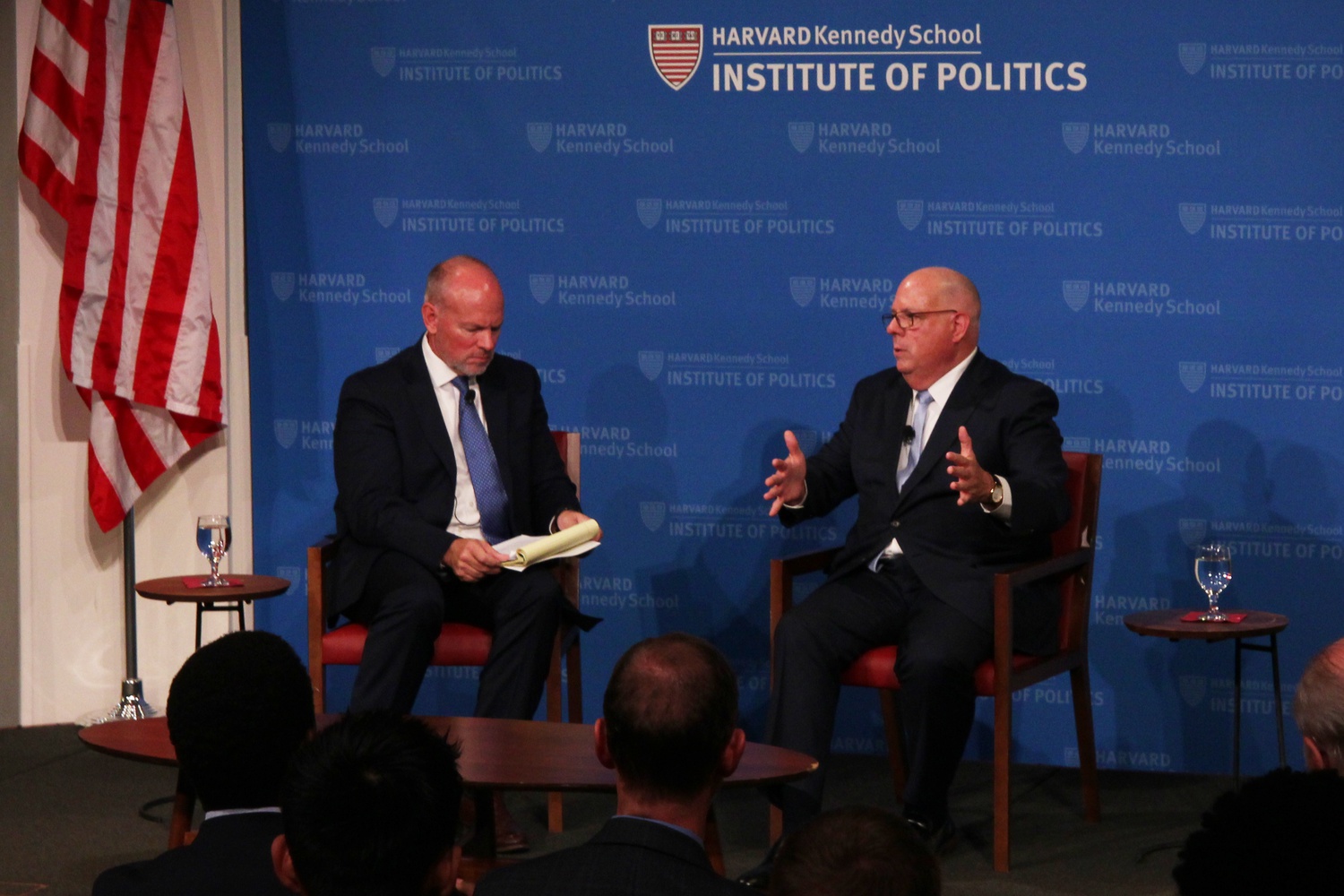 Maryland Governor Larry Hogan, right, speaks at a 2022 Harvard Institute of Politics forum.