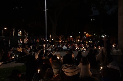 Cover image for Harvard Student Groups Hold Vigil for Palestinian Children Killed in Gaza