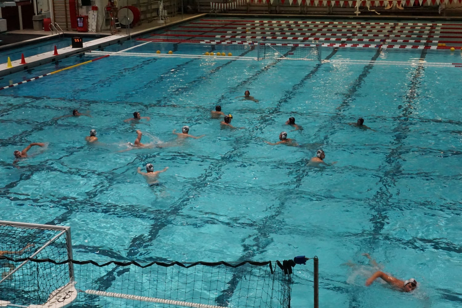Harvard men's water polo in action in Blodgett Pool on October 29, 2022. The team's exceptionally strong start to the season continued last weekend on the road.