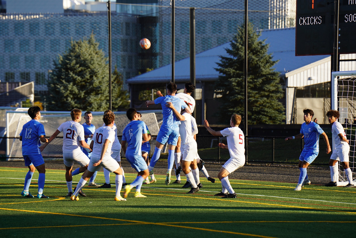 Harvard and Columbia battle for possession after a corner kick at Jordan Field on October 8, 2022.