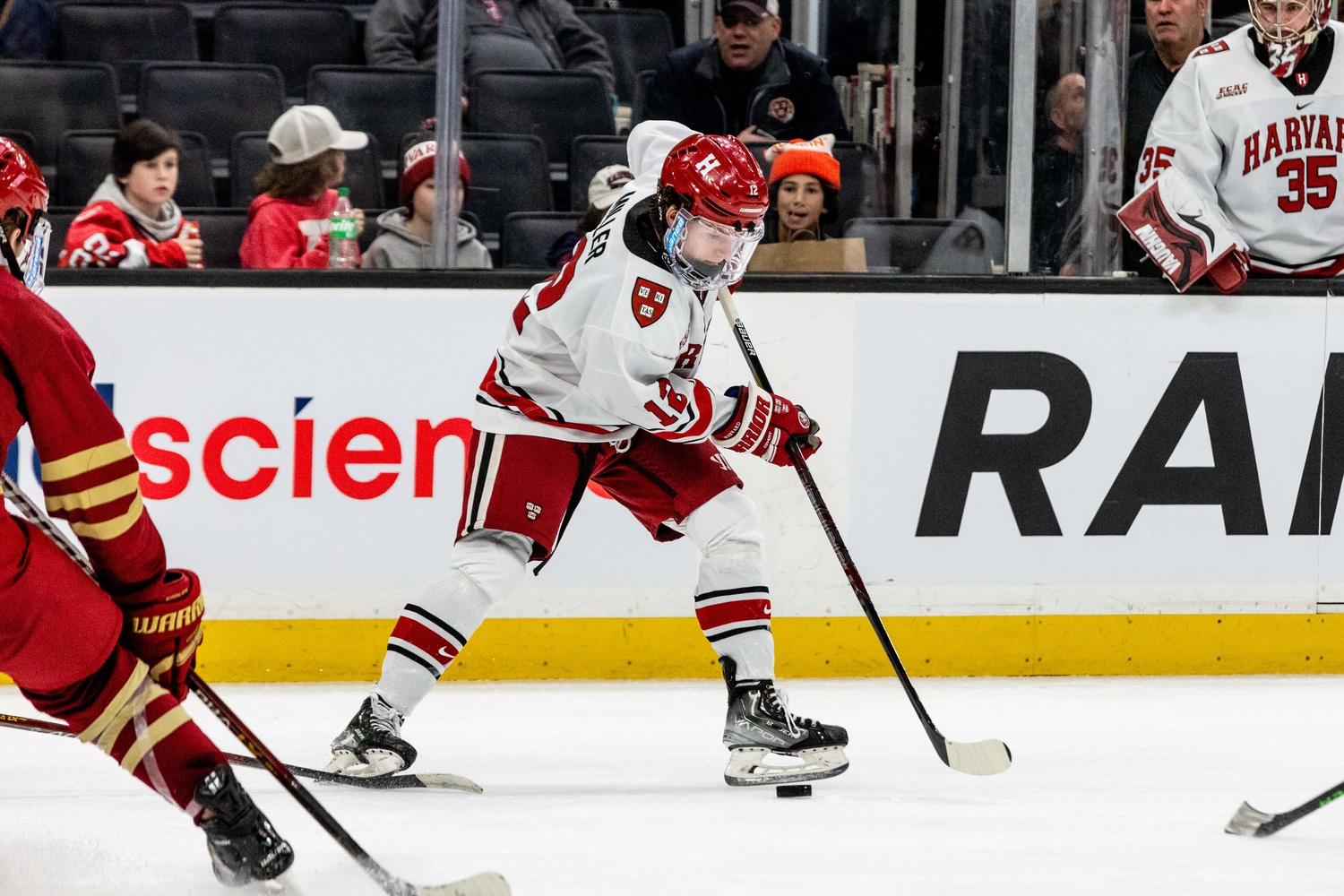 Then-first-year forward Joe Miller controls the puck against Boston College in the Beanpot Semifinals on February 6.