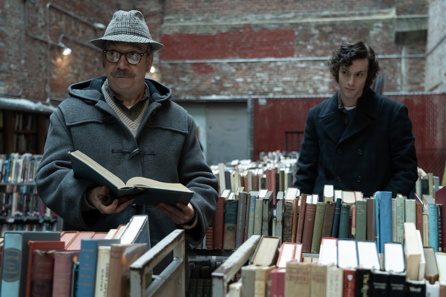 Dominic Sessa and Paul Giamatti star in "The Holdovers."