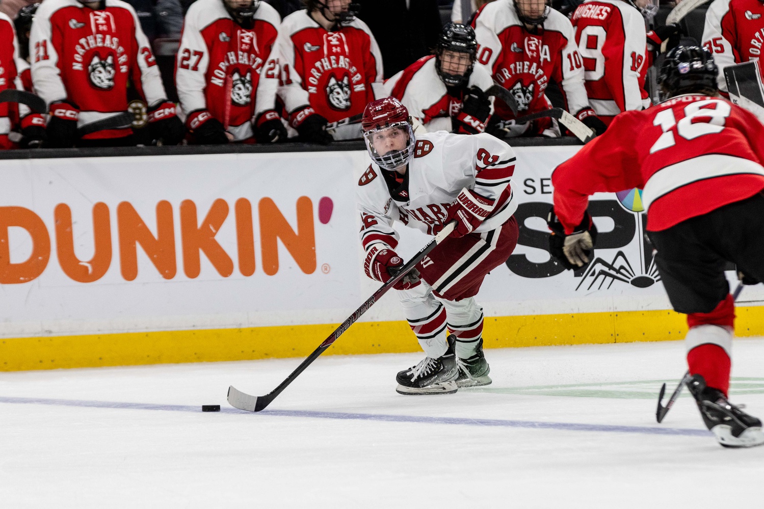Then-first-year forward Joe Miller skates up the ice against Northeastern in the Beanpot title game on February 13.