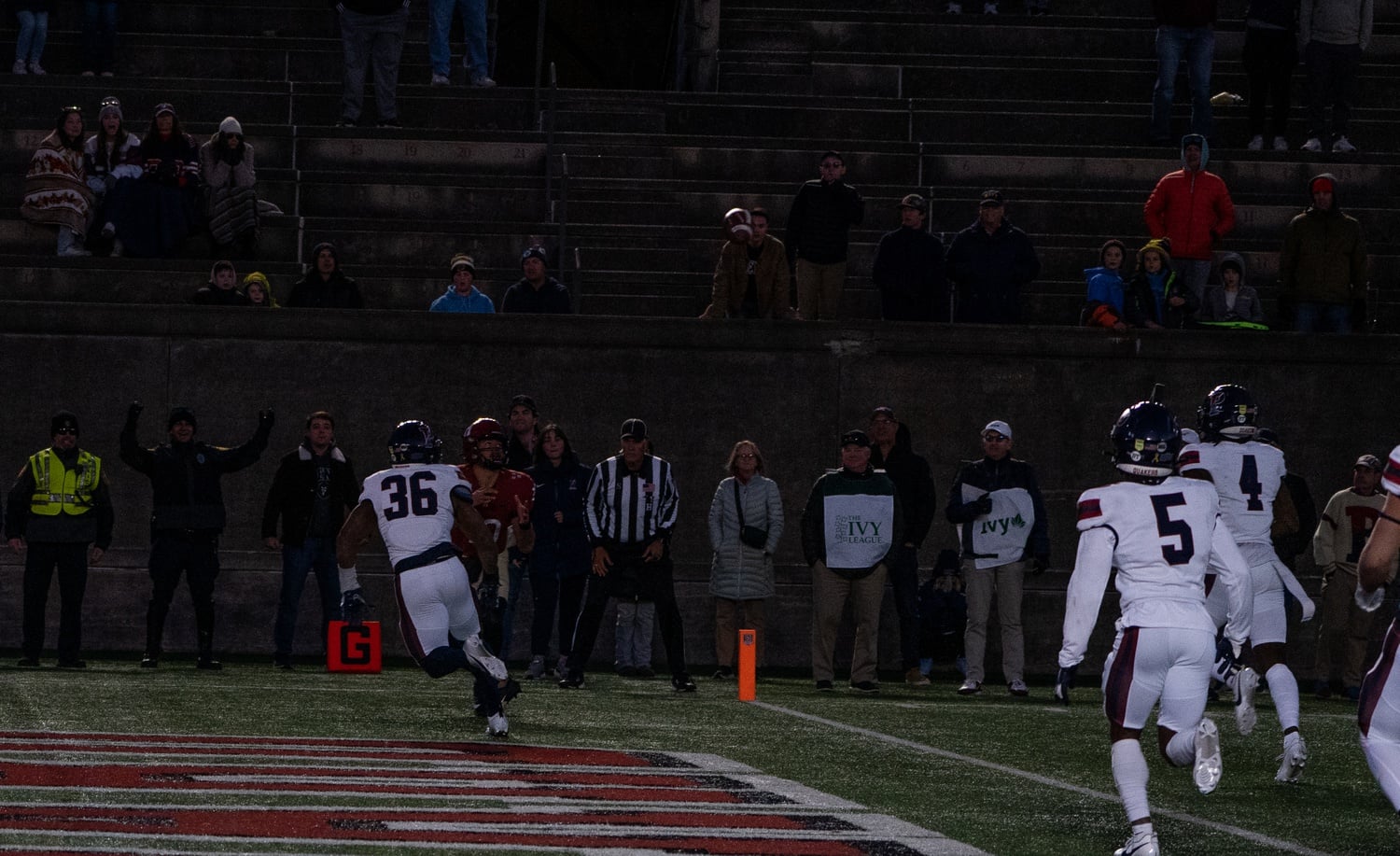 Sophomore quarterback Jaden Craig reels in the game-winning two-point conversion against Penn on Saturday, which secured a share of the Ivy League title for Harvard.