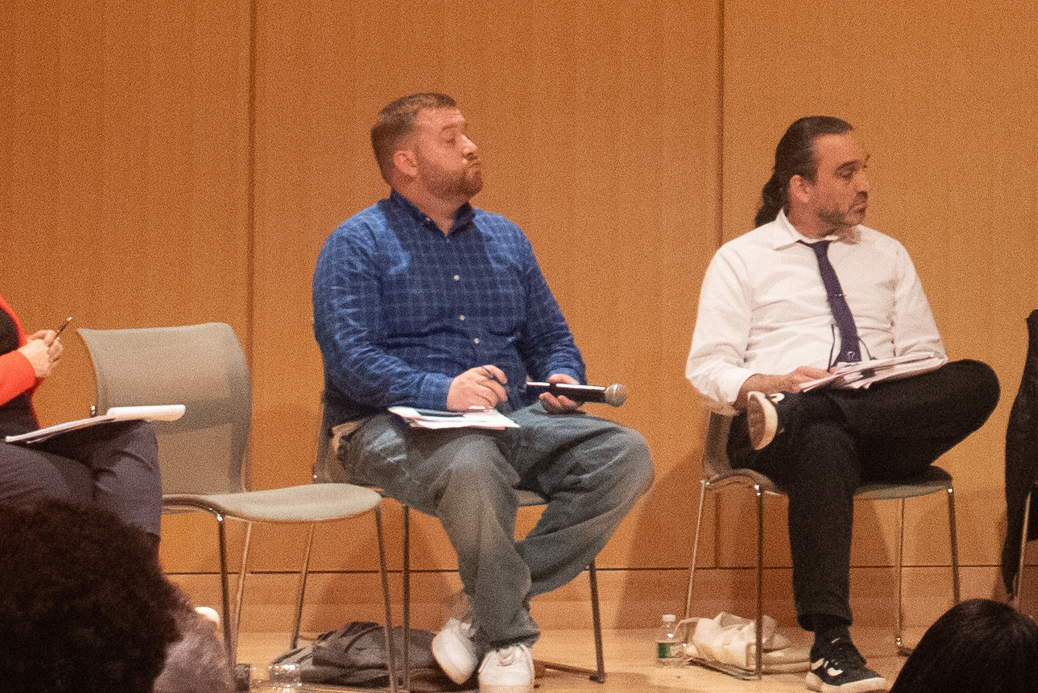 Andrew King, left, waits to speak at a Cambridge School Committee candidate forum on Oct. 17.
