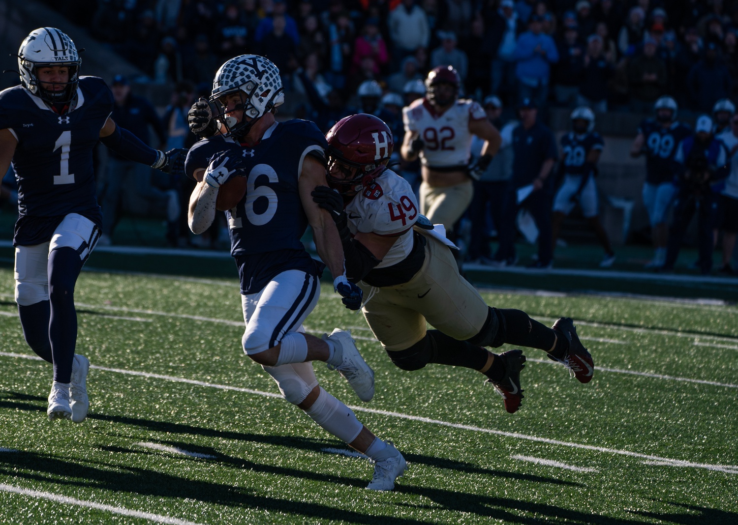 Senior linebacker Matt Hudson dives for a tackle against a Bulldog in the Nov. 19, 2023 rendition of The Game in New Haven, Conn. Hudson matched his career-high of 12 tackles.
