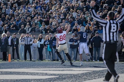 Cover image for Tyler Neville Scores a Touchdown for the Crimson