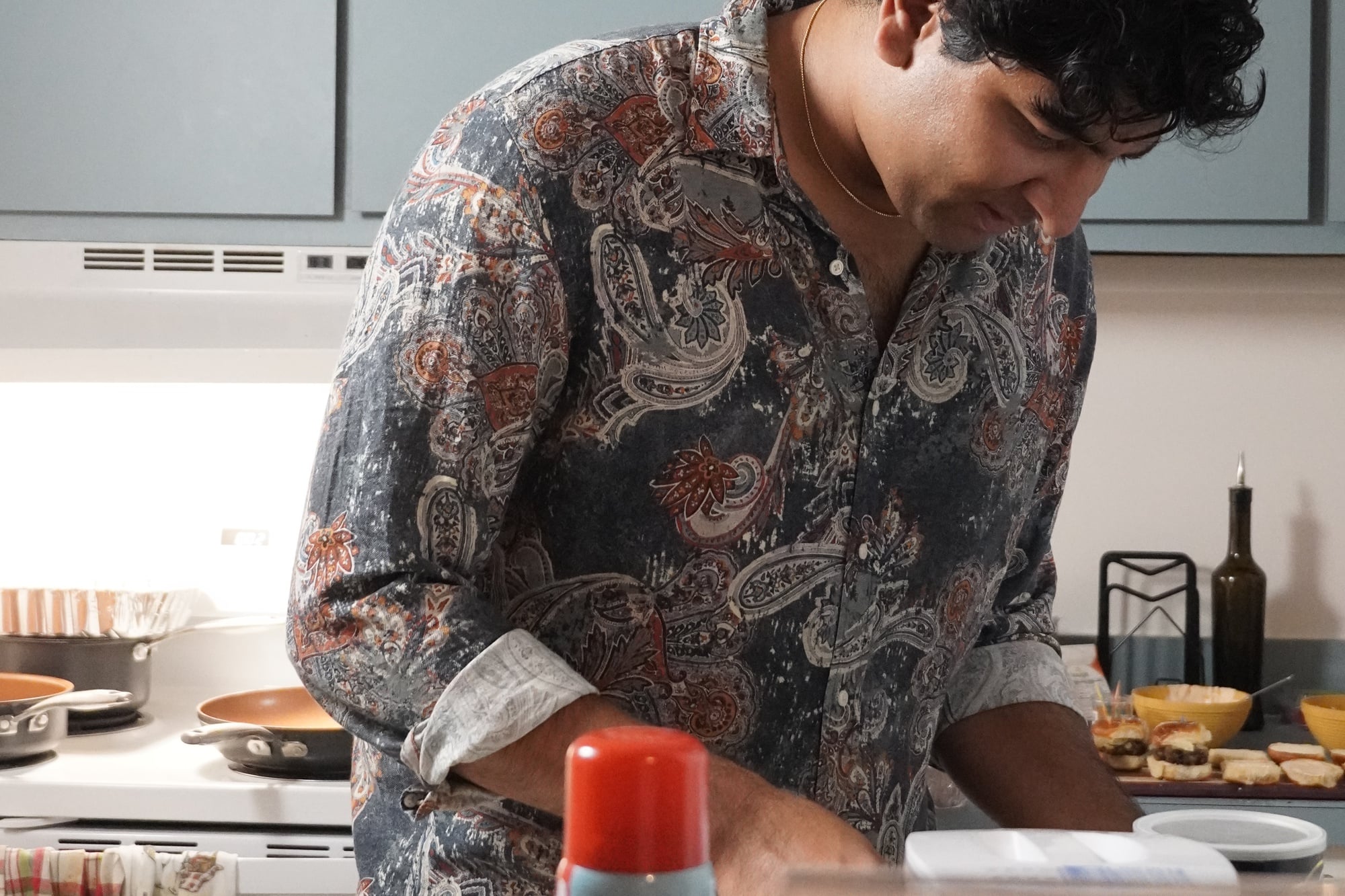 Suraag Srinivas prepares a dish at the “Hundredth Plate Celebration” of Dinner With Friends Boston, a biweekly-ish supper club.