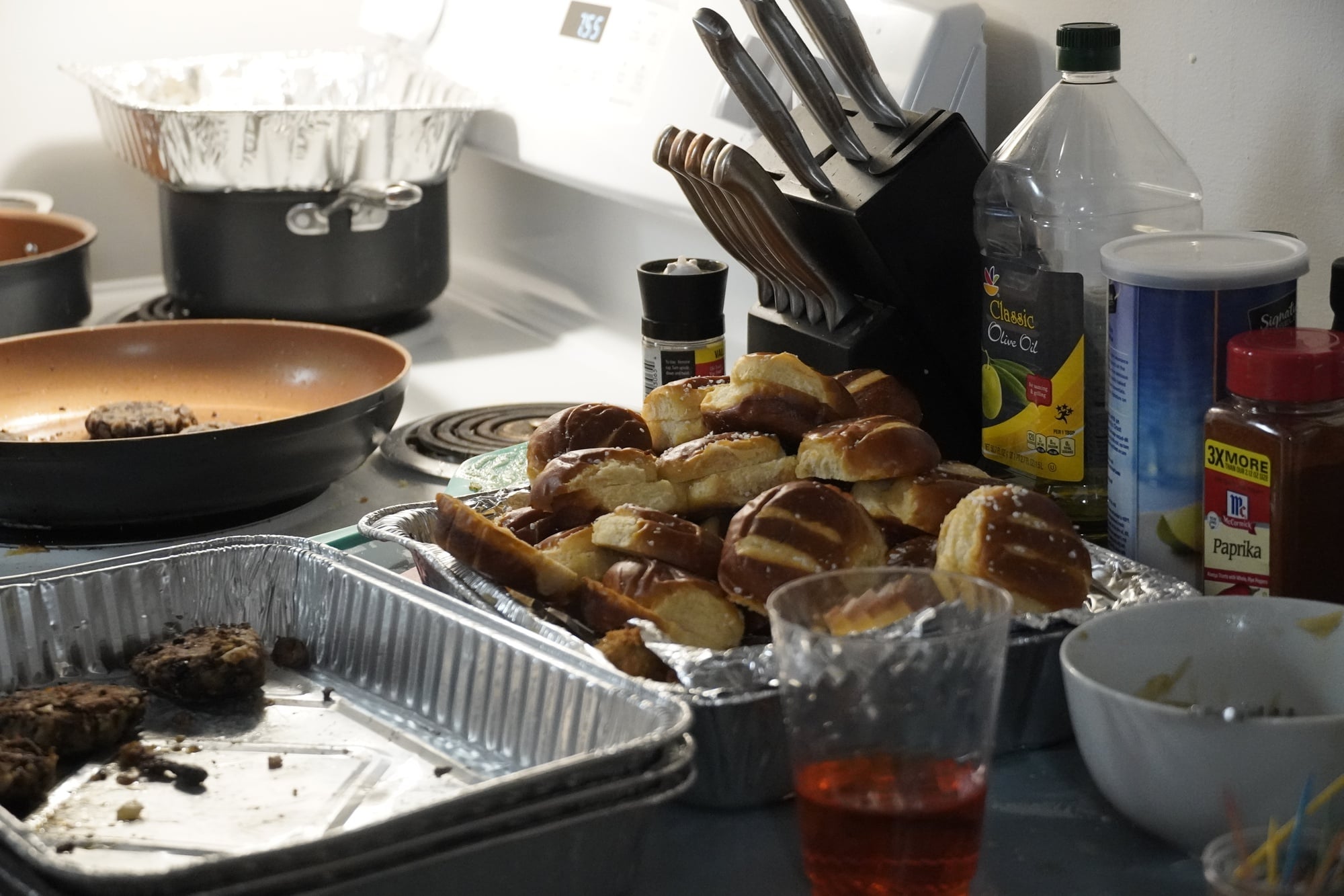 The menu at the "Hundredth Plate Celebration" of Dinner With Friends Boston is a conglomerate of foods that were hits in prior dinners, including black bean patties with onion and spicy mayo on Hawaiian rolls