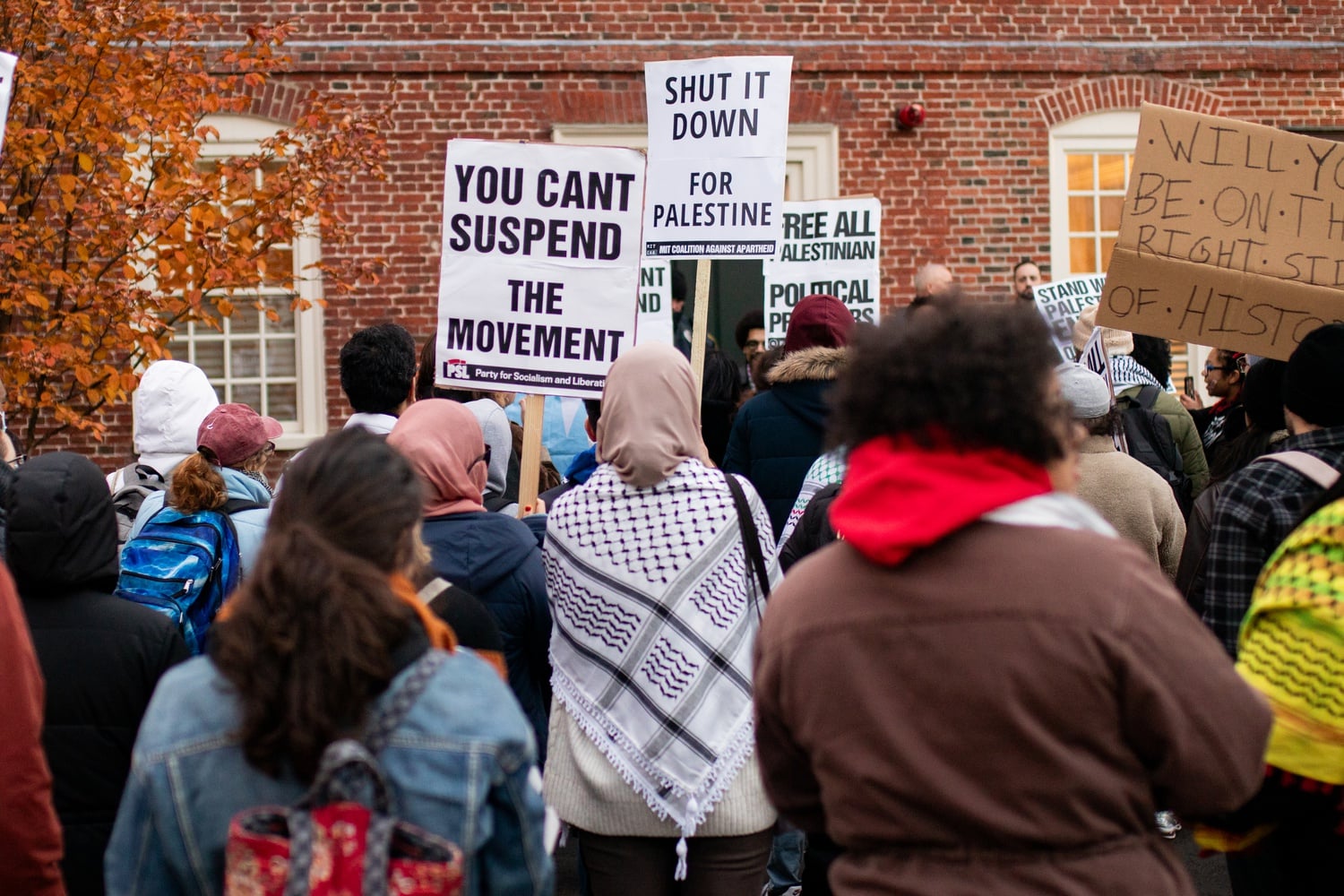 Pro-Palestine protesters demonstrate outside Massachusetts Hall, which houses the office of Harvard President Claudine Gay.