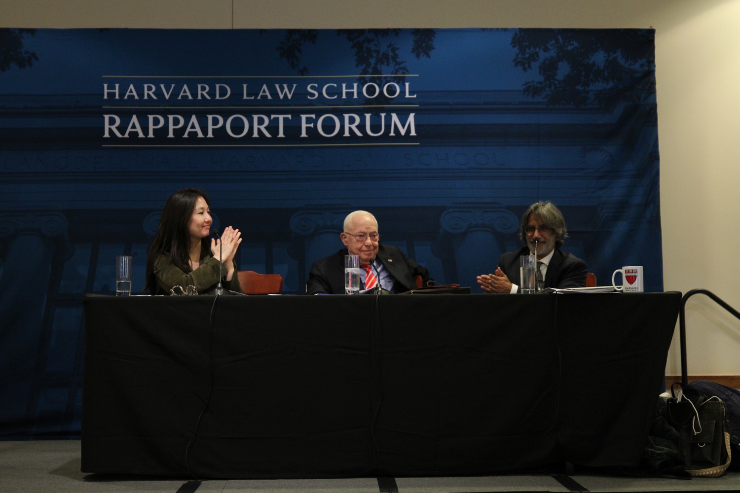 Former U.S. Attorney General Michael Mukasey (center) and Yale Law School professor Akhil Amar (right) spoke at a Thursday Harvard Law School Rappaport Forum event moderated by Harvard Law School professor Jeannie Suk Gersen.