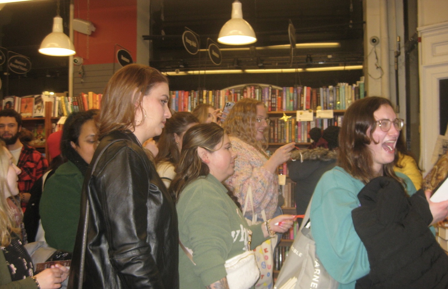 Sarah J. Maas fans gather at the Harvard Book Store's 'House of Flame and Shadow' midnight release party.