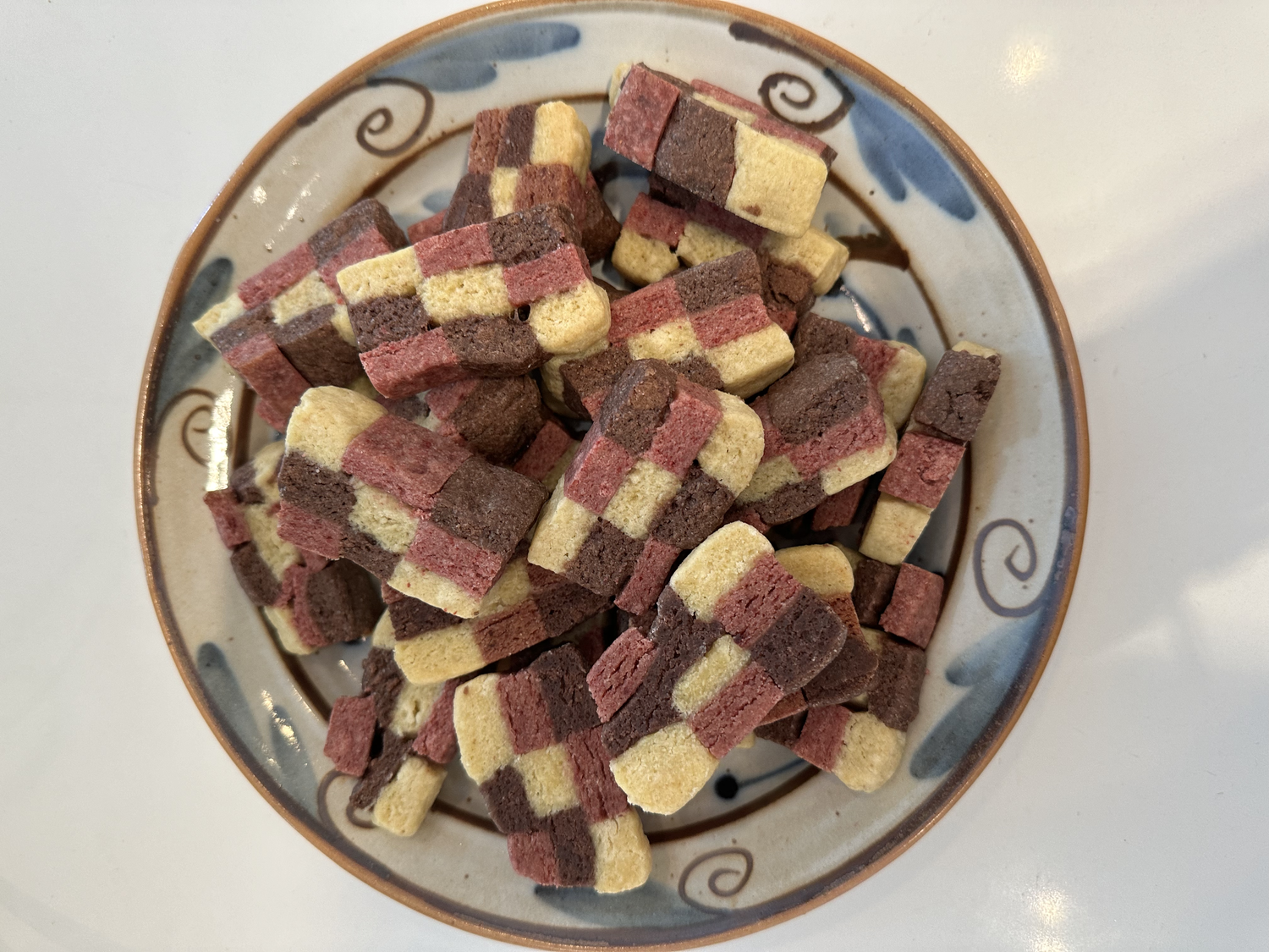 Interwoven layers of strawberry, chocolate, and vanilla shortbread yield a result that lets each flavor stand on its own.