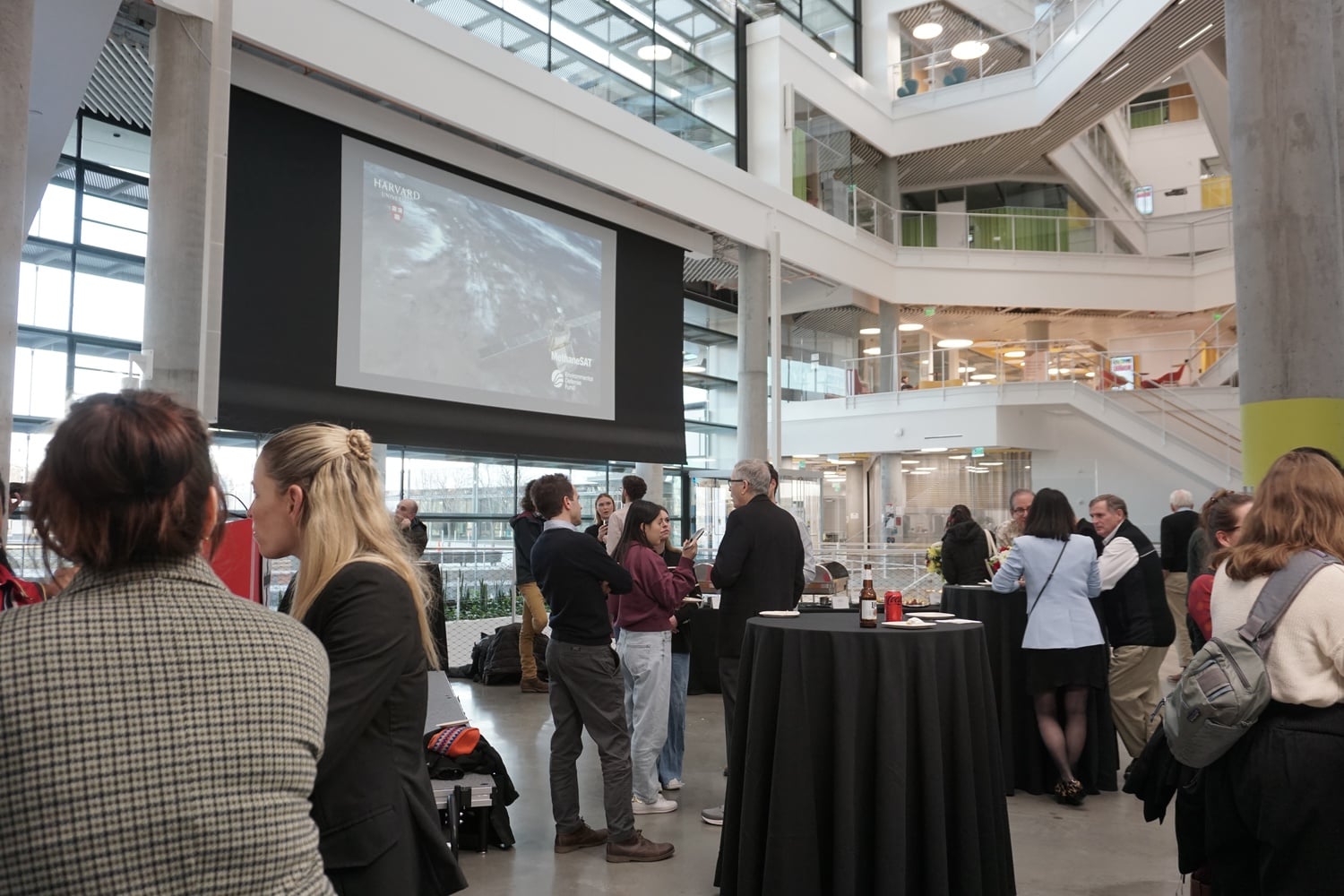 Guests meet at the Science and Engineering Complex for a celebration Friday afternoon. Dozens of Harvard affiliates gathered at the Science and Engineering Complex to celebrate the launch of MethaneSAT.
