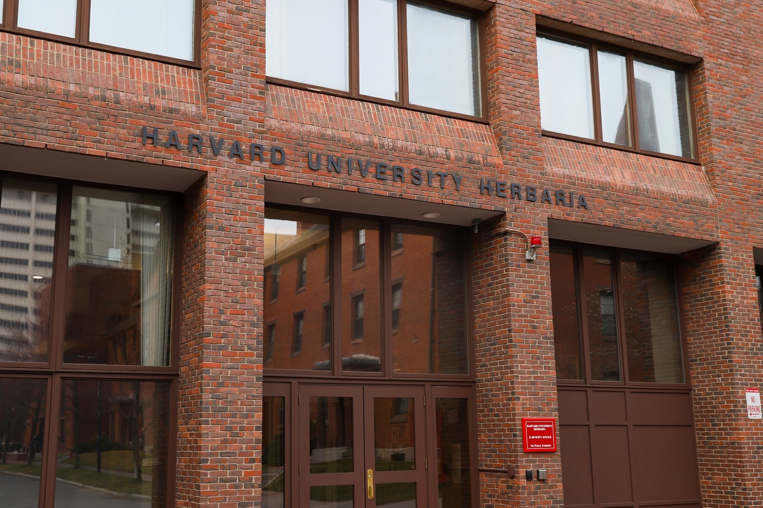 The Harvard University Herbaria is located behind the Harvard Museum of Natural History. Two luxury giants will fund botanical research by the Herbaria's Davis Lab for three years.