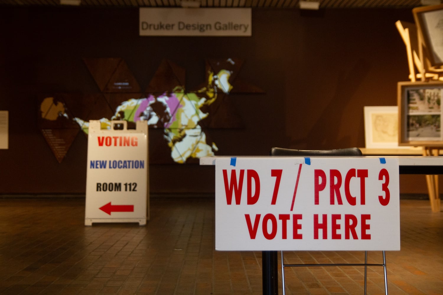 Students vote in a 2024 election at a polling place inside Gund Hall, a Harvard Graduate School of Design building.