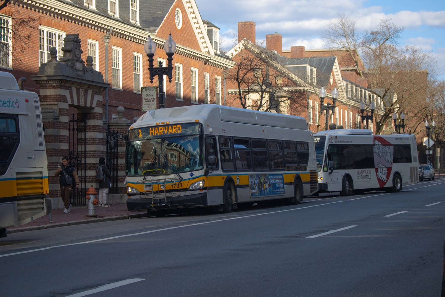 The 1 Bus reaches its final stop outside Widener Gate. The Cambridge City Council passed a policy order asking City Manager Yi-An Huang '05 to work towards implementing a fare-free Route 1 bus program.