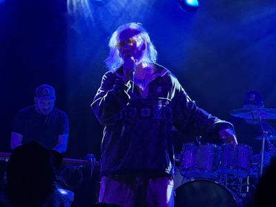 Cover image for Matisyahu Singing at Concert in Boston