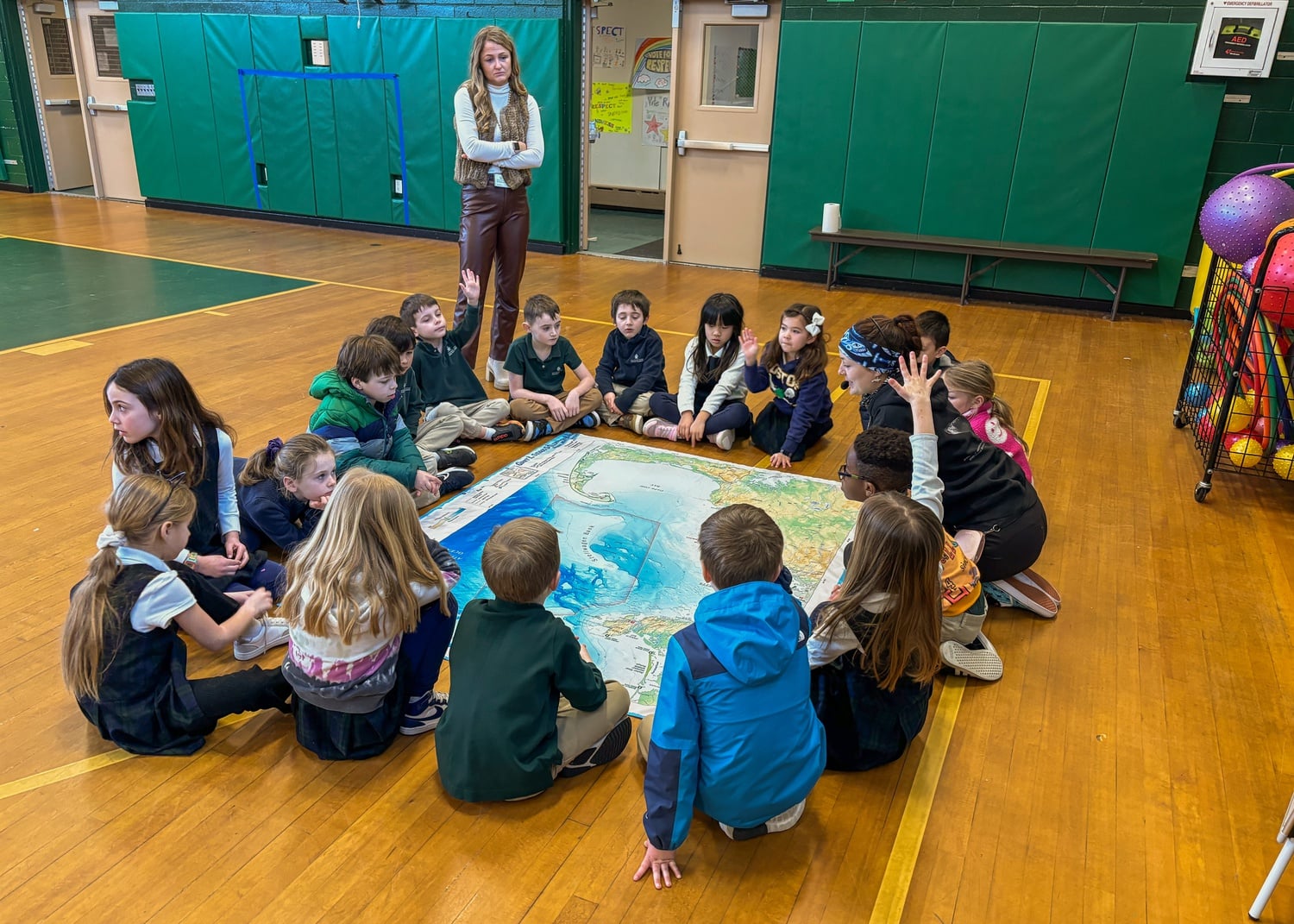After the in-whale lesson wrapped up, the kids gathered around a map of Cape Cod.