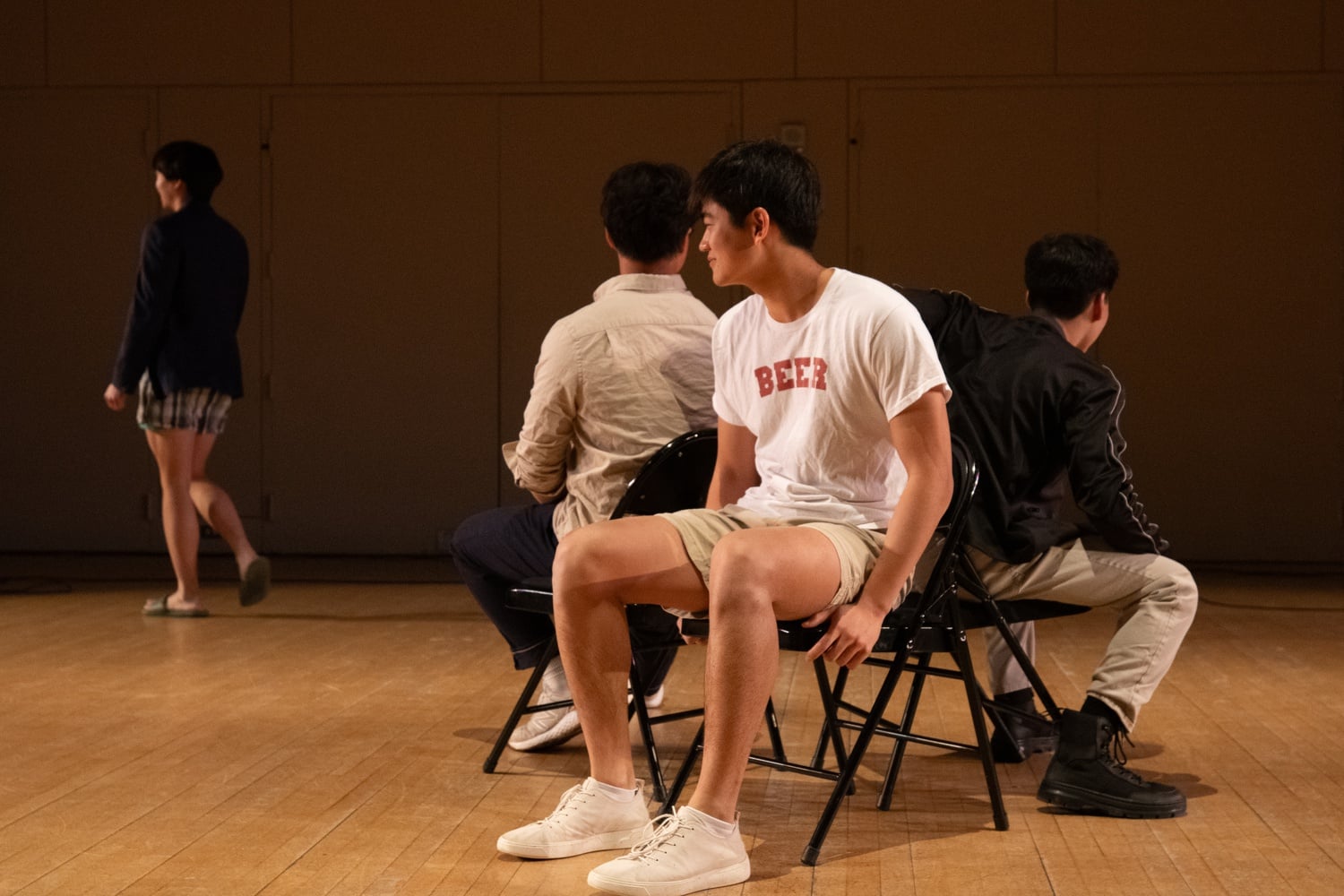 Contestants play a round of musical chairs. Peter Chen '27 was the winner.