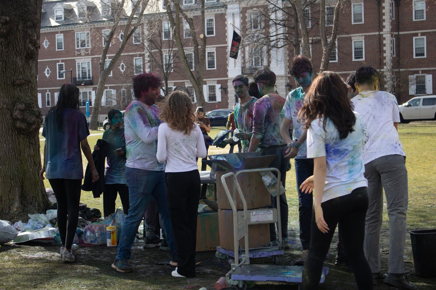 Harvard students gather to celebrate Holi on the Mac Lawn on Sunday. They celebrated the Hindu Festival of Colors, marking the arrival of spring.