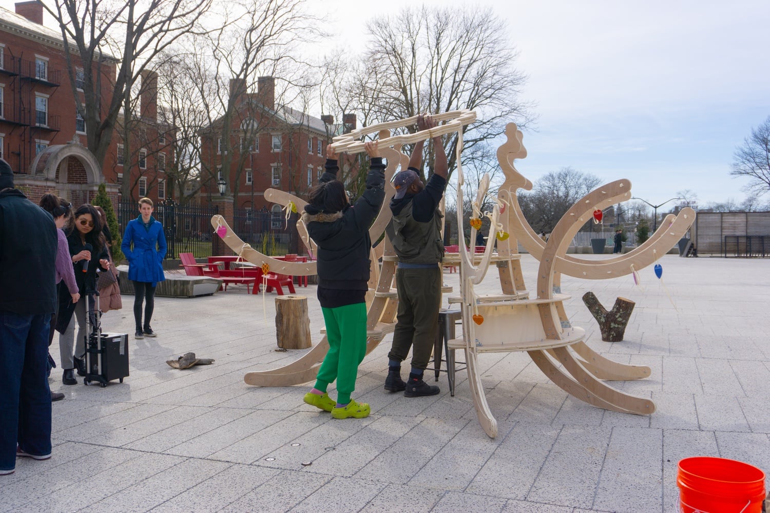 Ceylon Auguste-Nelson '16 and Mariah T. Browne '15 pose as statues in front of the Science Center as part of Women's Week 2014.