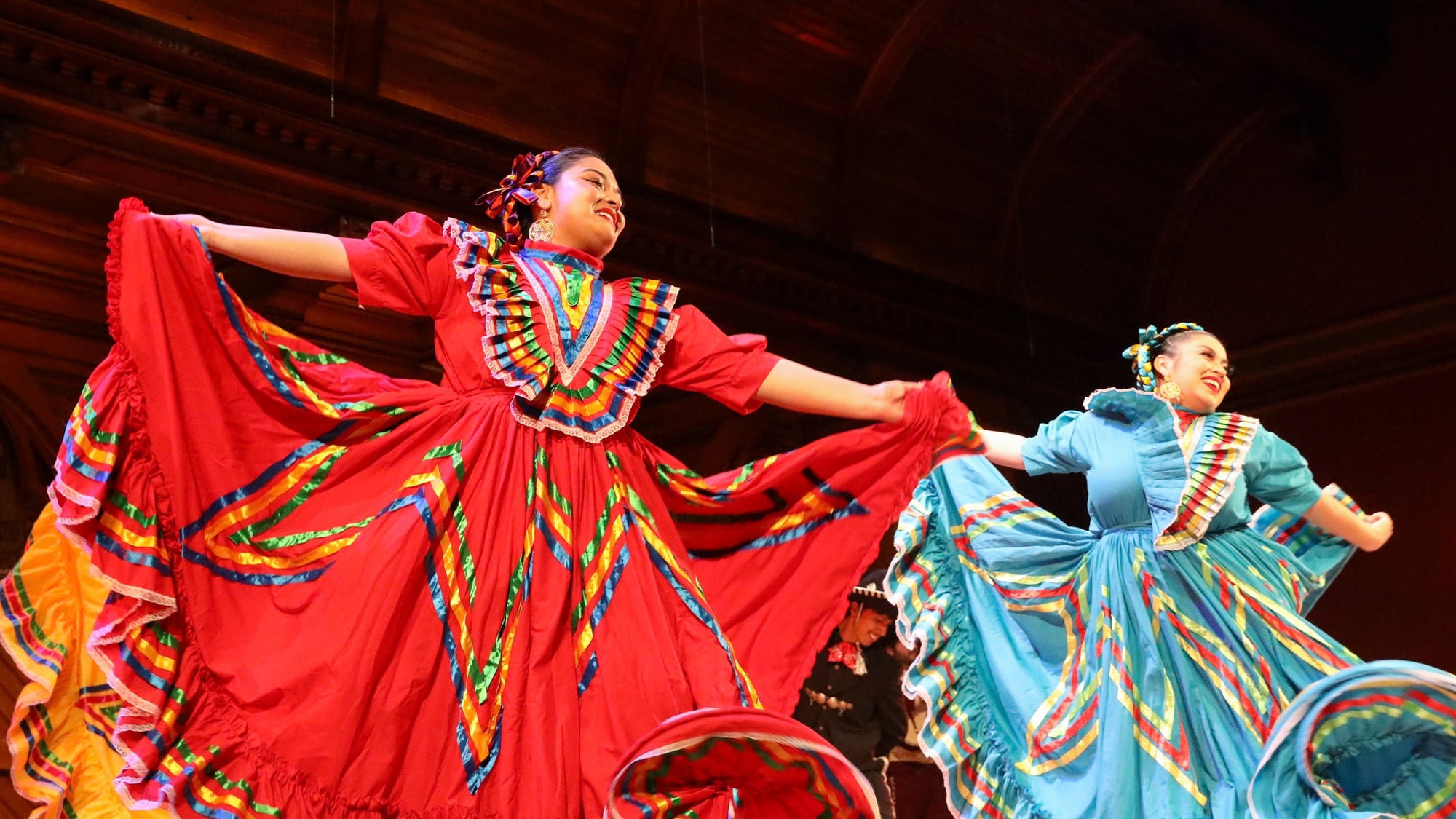 Dancers in RAZA Ballet Folklorico join Mariachi Veritas musicians in highlighting Mexico's culture through vibrant music and captivating dance.