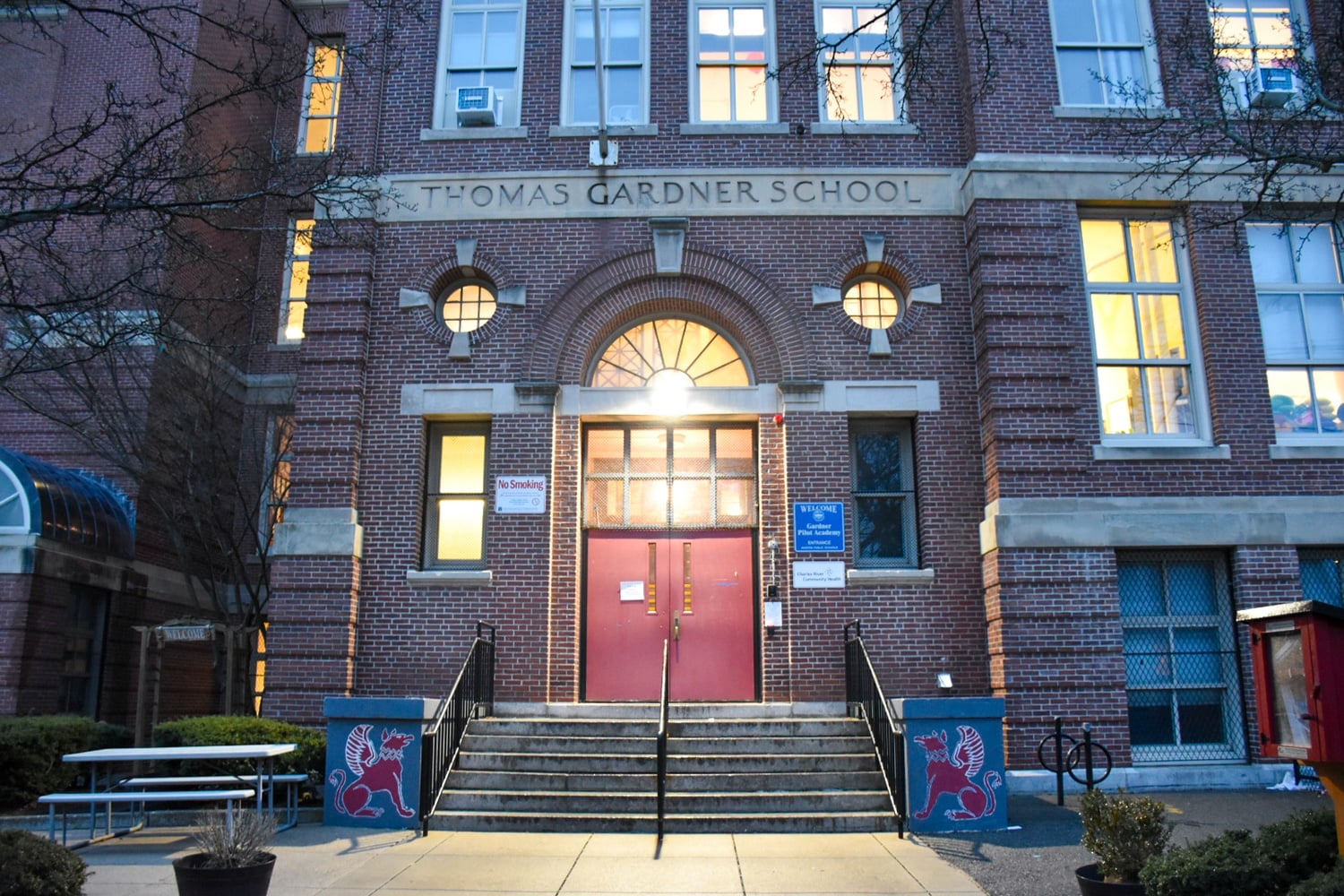 Parents and teachers at Allston's Gardner Pilot Academy are divided over the decision to remove the school's longtime principal.