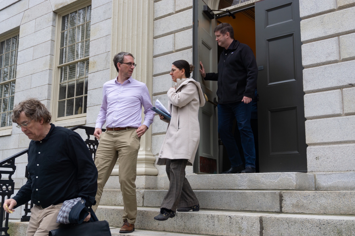 Professors leave University Hall after the April 2 faculty meeting. The Harvard FAS elected six new members to the Faculty Council.