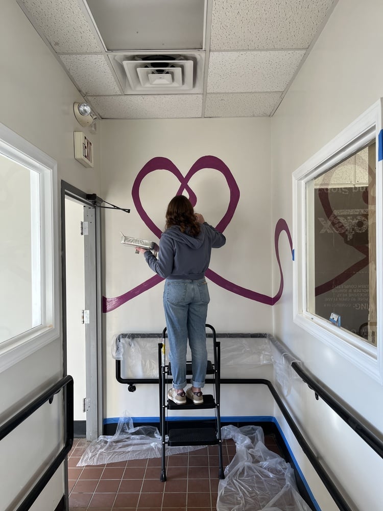 The community is engaged in every part of the process — they even are present while the spaces are being constructed.
