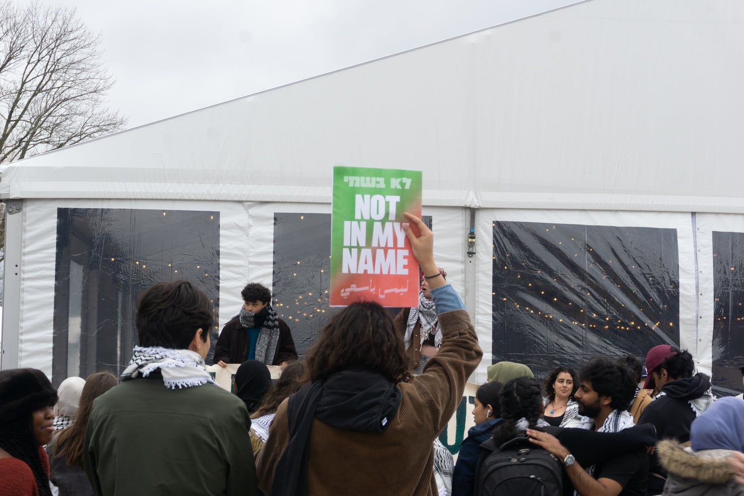 Students protest the indefinite postponement of a student-wide divestment referendum at the Science Center Plaza on Friday.