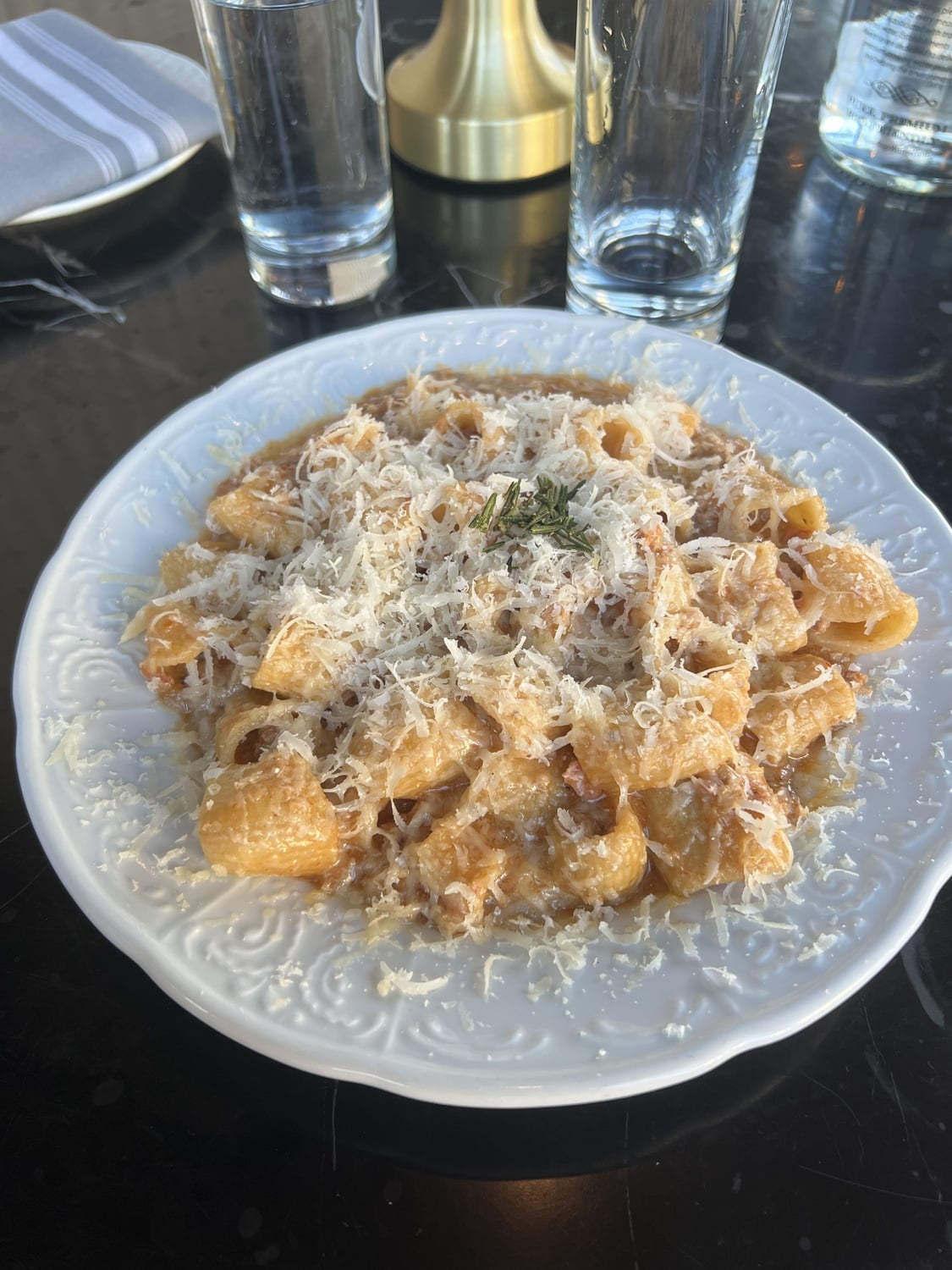 As for the food, the rigatoni bolognese stands out as a particularly delectable option on the menu.
